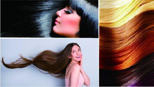 [設計師正在將染劑塗抹在髮絲上]